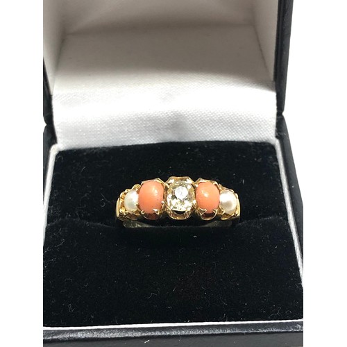 151 - An 18 carat gold opal coral & old cut diamond ring  with pearls coral with central old cut diamond d... 