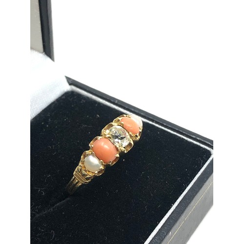 151 - An 18 carat gold opal coral & old cut diamond ring  with pearls coral with central old cut diamond d... 