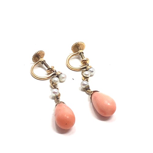 183 - A pair of antique 9ct gold coral drop & pearl set earrings  Drops 31 mm long Approx. 3.6 grams