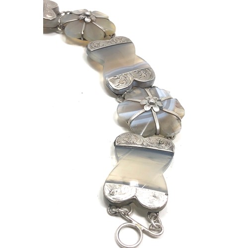 182 - An antique Scottish sterling silver agate bracelet measures approx 7 inches long, padlock 34 x 23 mm... 