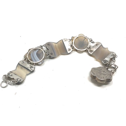 182 - An antique Scottish sterling silver agate bracelet measures approx 7 inches long, padlock 34 x 23 mm... 