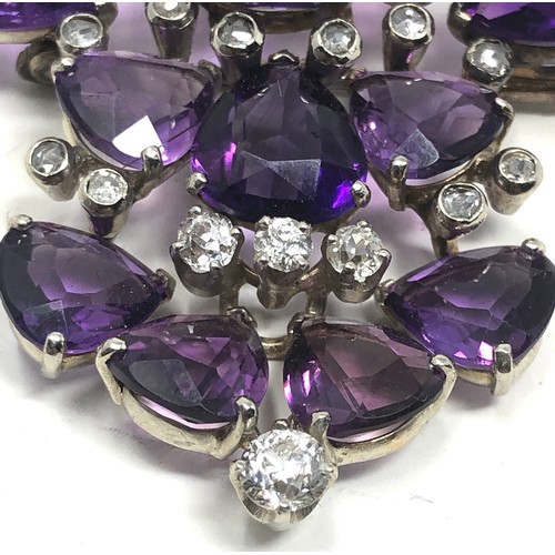 106 - A vintage 18ct white gold Diamond & amethyst brooch;  set with bright heart shaped amethysts and dia... 