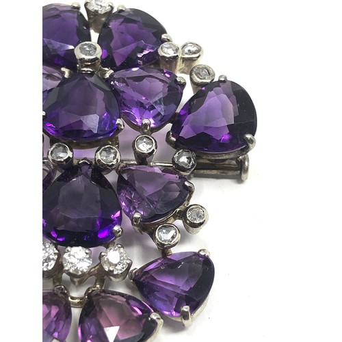 106 - A vintage 18ct white gold Diamond & amethyst brooch;  set with bright heart shaped amethysts and dia... 