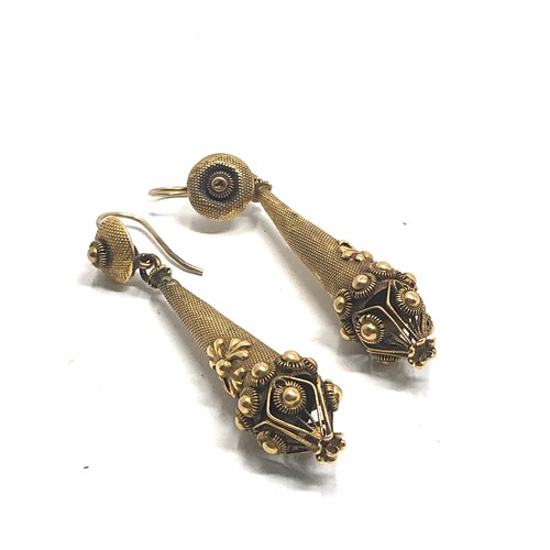 162 - A pair of antique  15 carat gold  long drop earrings; with later wires, wonderful textured details a... 