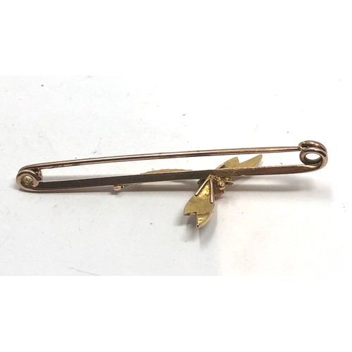 114 - An antique 9 carat gold coral & pearl dragonfly brooch; 67 mm long . 5.6 grams.