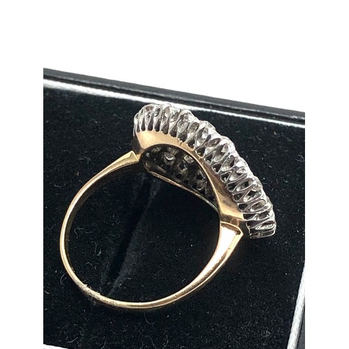 155 - Fine  18 carat gold diamond ring; set with a large array of sparkling old cut diamonds in platinum s... 