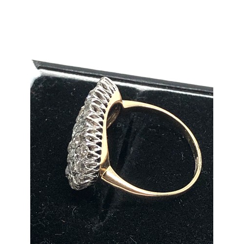 155 - Fine  18 carat gold diamond ring; set with a large array of sparkling old cut diamonds in platinum s... 