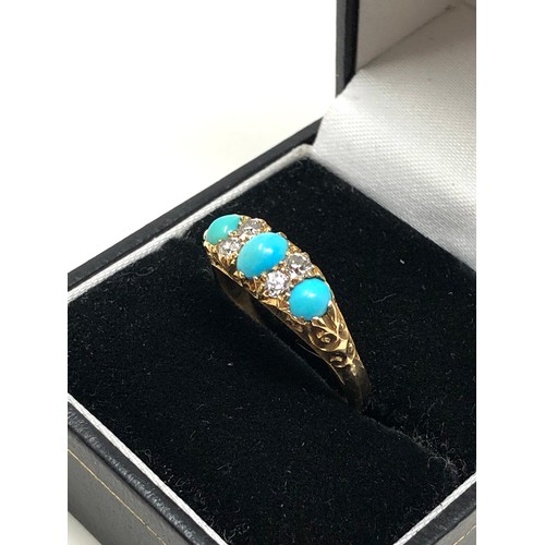 165 - An antique 18 carat gold turquoise & diamond ring  Approx. 3.6 grams.