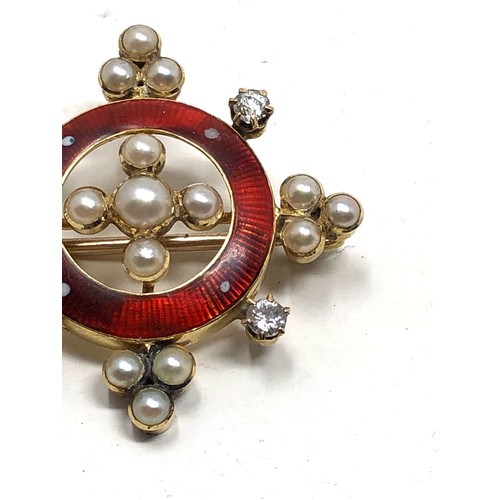 167 - Antique 15ct gold red enamel diamond & pearl pendant / brooch measures approx 3.2cm dia weight 5.9g