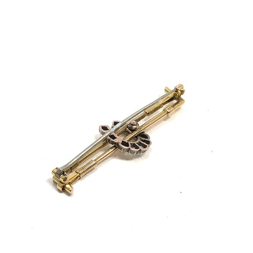 164 - Fine antique gold & diamond horseshoe & riding crop brooch measures approx 4.6cm wide weight 4.3g