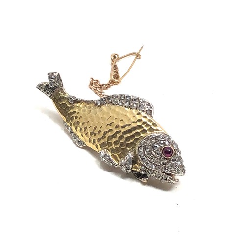 91 - Fine Antique gold & diamond fish brooch with ruby eye measures approx 4.1cm wide weight 15.2g