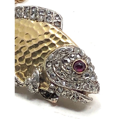 91 - Fine Antique gold & diamond fish brooch with ruby eye measures approx 4.1cm wide weight 15.2g