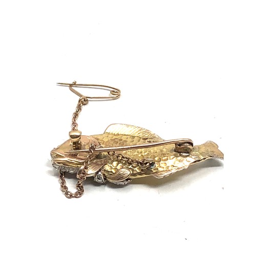 91 - Fine Antique gold & diamond fish brooch with ruby eye measures approx 4.1cm wide weight 15.2g