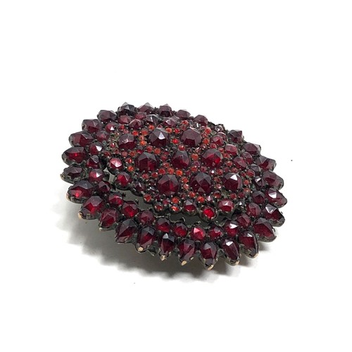 147 - Antique Bohemian garnet locket back pendant / brooch  measures approx 4.1 by 3.3cm