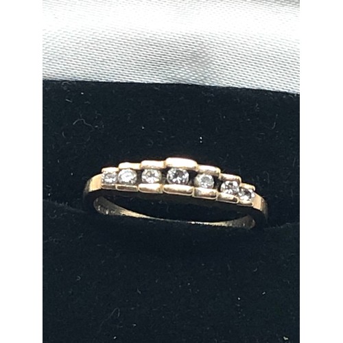 166 - 9ct gold diamond seven stone ring (1.9g)