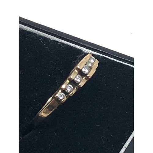 166 - 9ct gold diamond seven stone ring (1.9g)