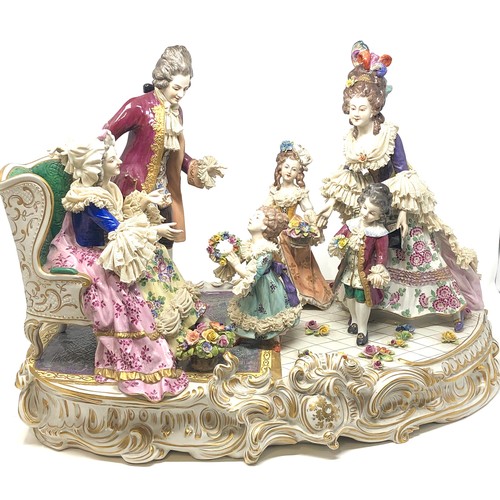 410 - large volkstedt  porcelain figure group measures approx 60cm wide height by 45cm high minor damage a... 