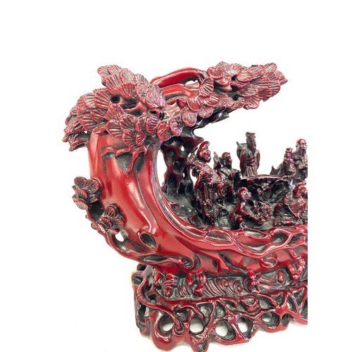 74 - Carved oriental resin ornament, approximate measurements Height 6.5 inches, Length 8 inches