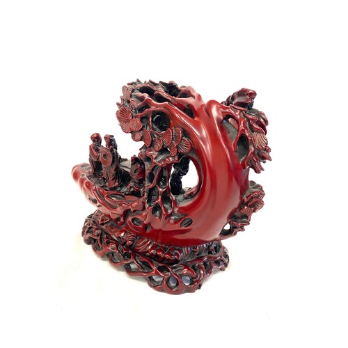 74 - Carved oriental resin ornament, approximate measurements Height 6.5 inches, Length 8 inches