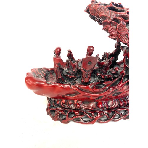 74 - Carved oriental resin ornament, approximate measurements Height 6.5 inches, Length 8 inches