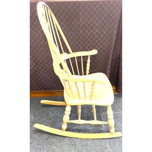 554 - Pine Windsor rocking chair, overall height: 46 inches, Width of arms 25.5 inches