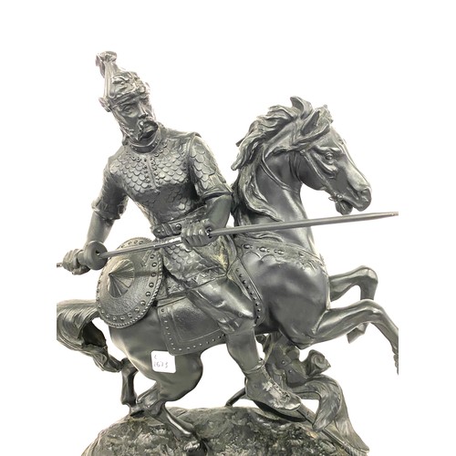 99 - Large Spelter figure of a warrior on horse on a wooden base measures approx 19