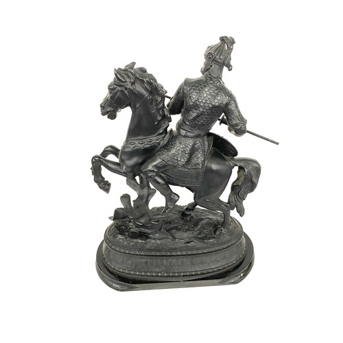 99 - Large Spelter figure of a warrior on horse on a wooden base measures approx 19