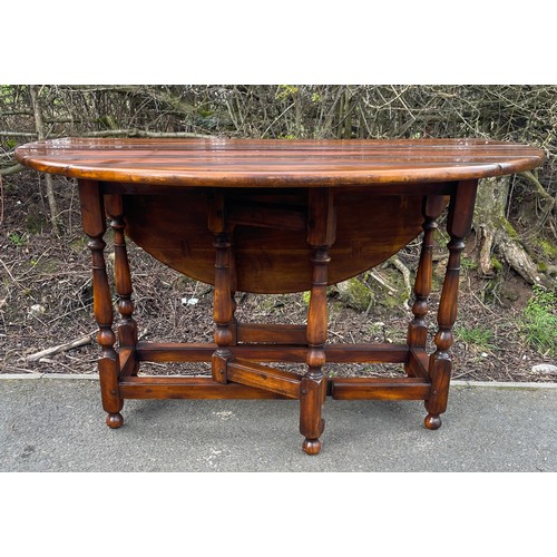 540 - Oak gateleg table, approximate measurements: Height 30 inches, Length 50 inches, Depth with leaves 5... 