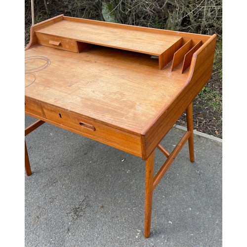 565 - 1960s Teak Danish desk, approximate measurements: Height 32.5 inches, Width 39.5 inches, Depth 27.5 ... 