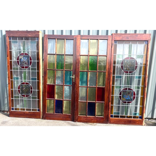 557 - 2 Vintage stained glass doors with side panels, approximate measurements: Length 125 inches, Height ... 