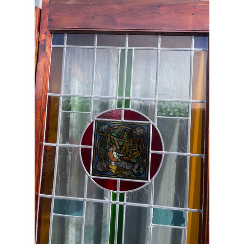 557 - 2 Vintage stained glass doors with side panels, approximate measurements: Length 125 inches, Height ... 