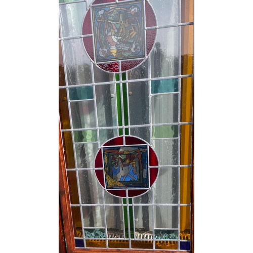 557 - 2 Vintage stained glass doors with side panels, approximate measurements: Length 125 inches, Height ... 