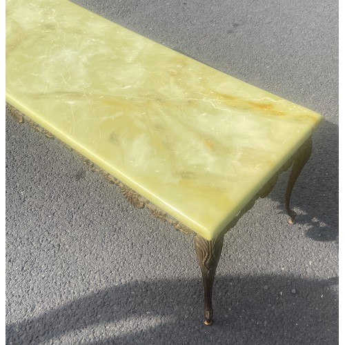 543 - Brass and faux onyx top coffee table, approximate measurements: Height 16 inches, Width 48 inches, D... 