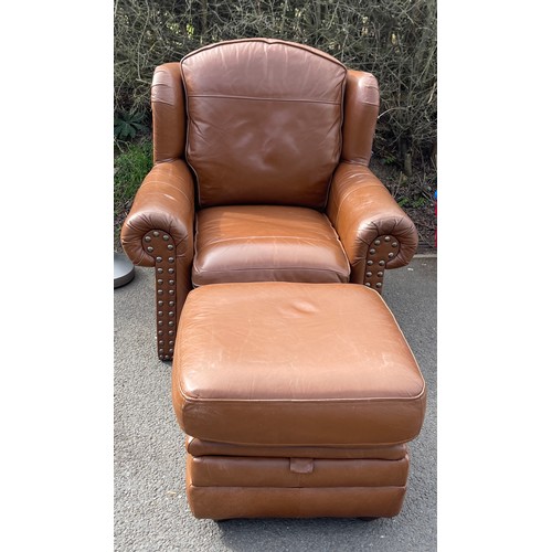 542 - Thomas Lloyd leather chair and footstool