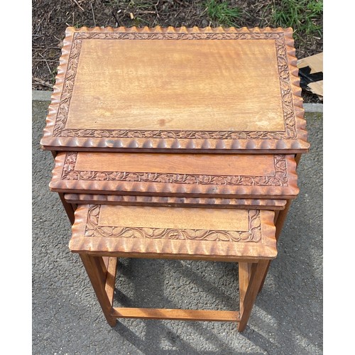 547 - Nest of 4 carved top fruit wood tables