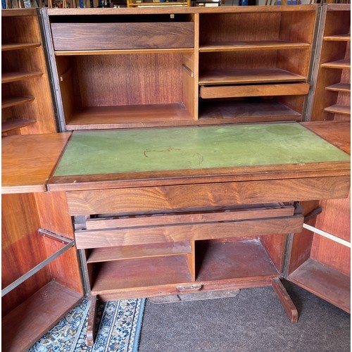 518 - Vintage teak desk in a box when it is closed this looks like an ordinary cabinet, but unfolded revea... 