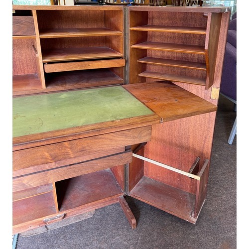 518 - Vintage teak desk in a box when it is closed this looks like an ordinary cabinet, but unfolded revea... 