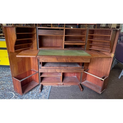 518 - Vintage teak desk in a box when it is closed this looks like an ordinary cabinet, but unfolded revea... 