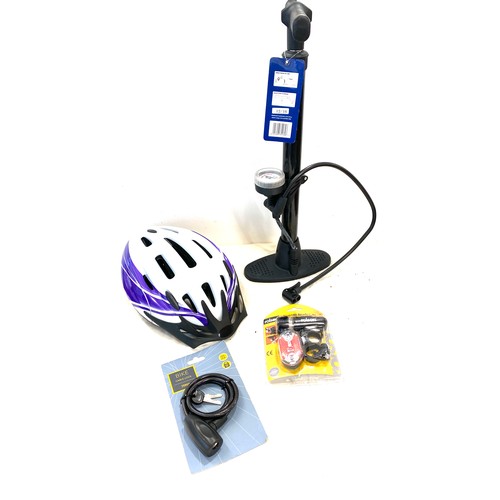 95 - Selection of new cycling equipment, to include pump helmet, etc