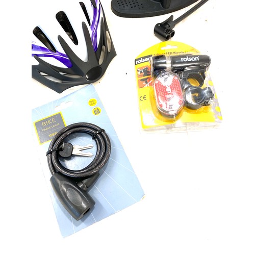 95 - Selection of new cycling equipment, to include pump helmet, etc