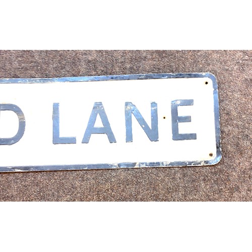 98 - Vintage metal Rutland Lane street sign, approximate measurement: Height 9 inches Width 47 inches