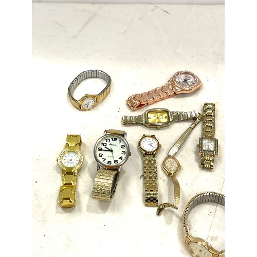 556 - Selection of gold tone ladies and gents wristwatches, all untested