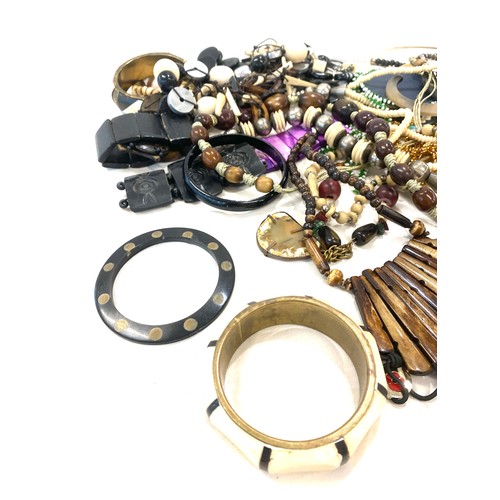 575 - Box of vintage costume jewellery to include bone pieces