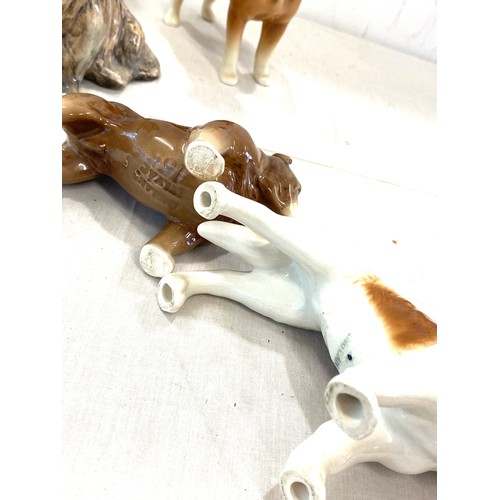 174 - Selection of 5 Sylvac dog ornaments, to include  317,155, 1548, 76 (broken leg)  all in good overall... 