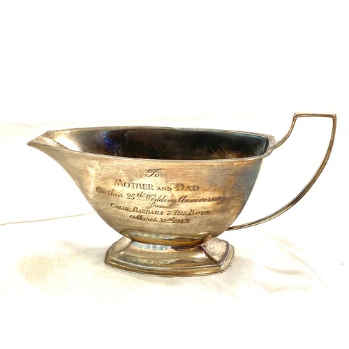 578 - Vintage silver hallmarked gravy boat, has presentation engraving, approximate weight 137.9g