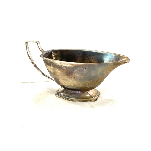 578 - Vintage silver hallmarked gravy boat, has presentation engraving, approximate weight 137.9g