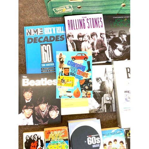 210 - Selection of musical artist books to include The Beatles, Rolling Stones, John Lennon etc