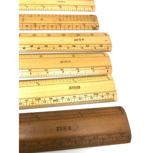 432 - Boxed set of antique rulers