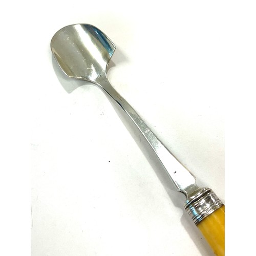 555 - Hallmarked silver and ivory London 1894 Cheese scoop, total approximate weight 113g