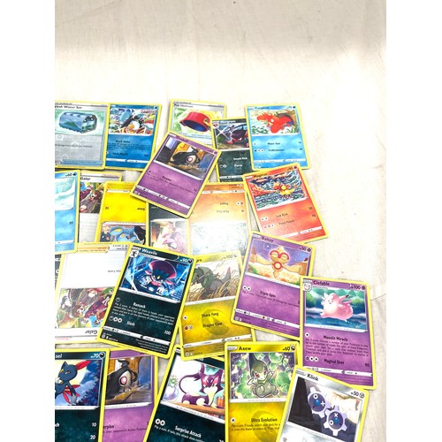 154 - Selection of Pokemon collectors cards dating from 1995 onwards, Rev Halo, approximately 90